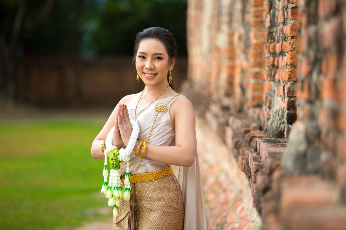 Beautiful woman in Thai old traditional costume , portrait at the ancient Ayutthaya temple.
